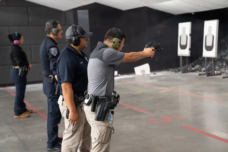 Cadets in firing range shooting targets