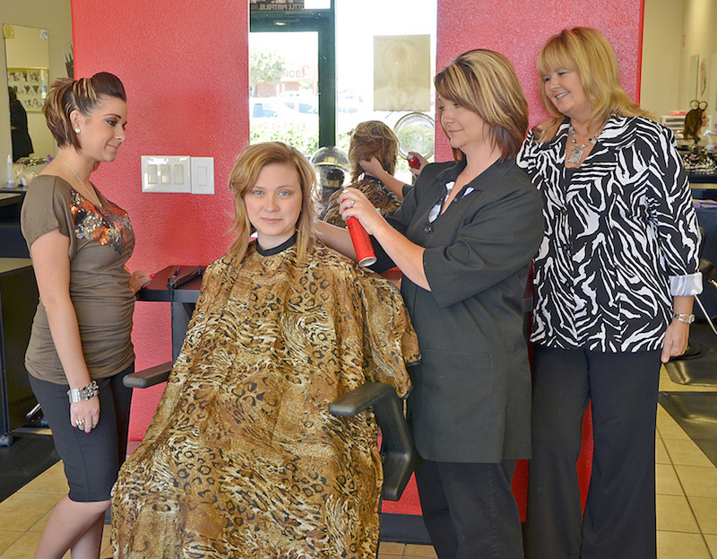 Instructor styling hair