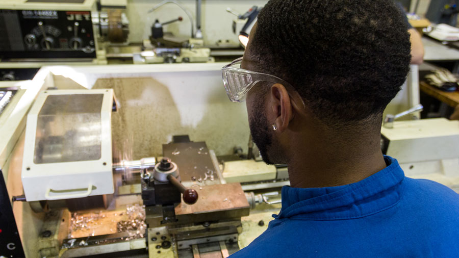 Man using a control panel