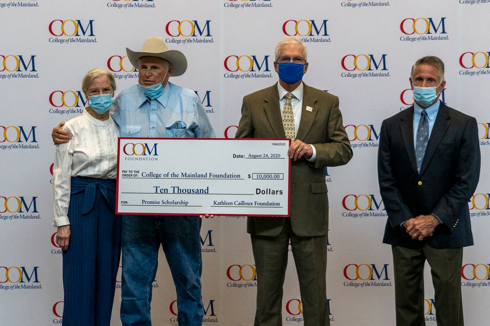 Pictured are (l-r) Paula and TJ Heileman, COM President Dr. Warren Nichols and COM Board Chair Kyle Dickson.