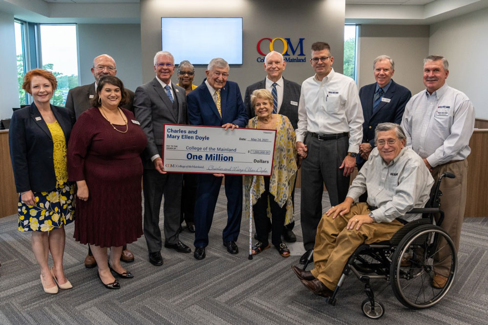 College of the Mainland BOT receiving a check for one million dollars.