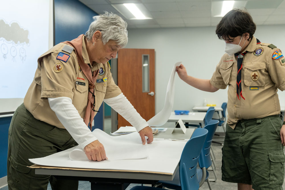 Boy Scout instructor giving a demonstration.