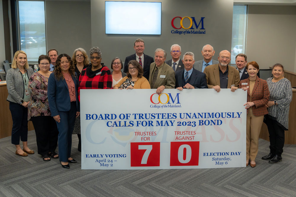 College of the Mainland (COM) Board of Trustees on Monday, January 23, unanimously approved calling for a $250 million May bond election. COM trustees and staff gathered for a group photo following the vote.