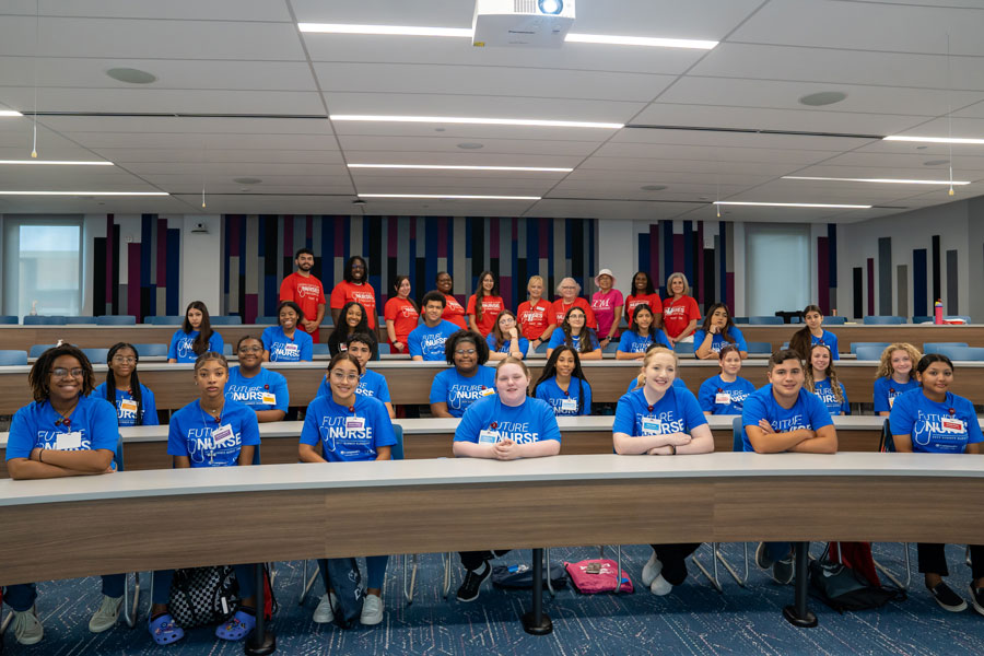 High school students with COM nursing program faculty