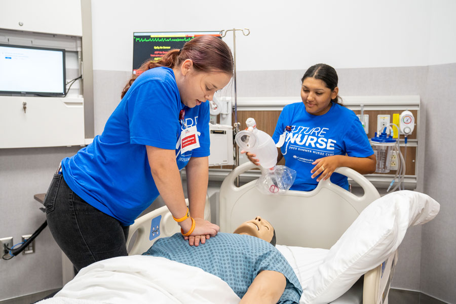 Students learning CPR